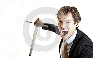 Crazy businessman attacking with sword