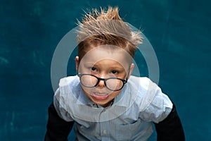 Crazy businessman child with eyeglasses