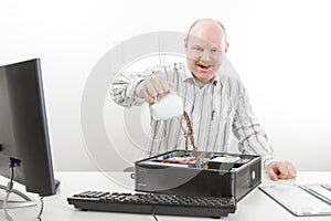 Crazy Businessman Pouring Coffee In Computer Chassis