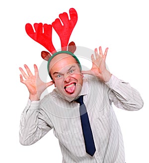 Crazy businessman with rudolph reindeer attire.