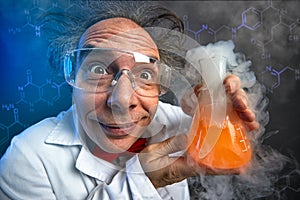 Crazy chemist with test tube photo