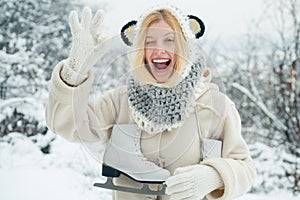 Crazy comical face. Happy winter fun woman. Portrait of a happy teenage girl in the snow. Attractive young woman in