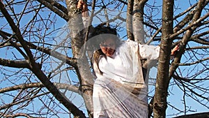 Crazy Dark-Haired Woman In Long White Nightie