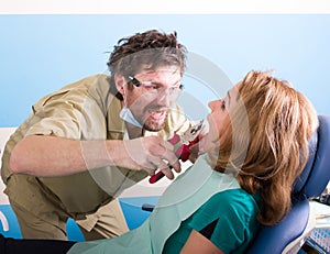 Crazy dentist patient at the dentist, the patient is terrified