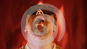 Crazy fun positive face man in gold glitter. Comical photo shake head funny person. Expression emotion guy in sunglasses