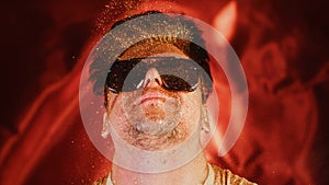 Crazy fun positive face man in gold glitter. Comical photo shake head funny person. Expression emotion guy in sunglasses