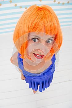 Crazy girl advertising her orange hairstyle. time for new haircut. hairstyle advertising for hairdresser salon. crazy