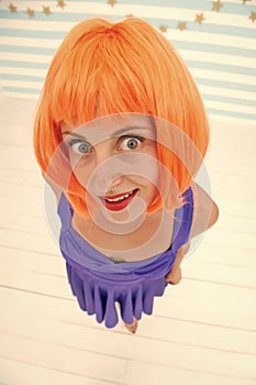 Crazy girl advertising her orange hairstyle. time for new haircut. hairstyle advertising for hairdresser salon. crazy