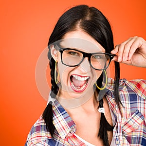 Crazy girl wear nerd glasses shouting