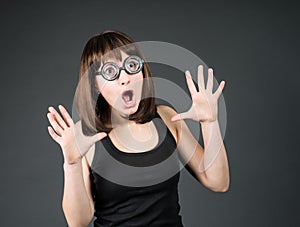 Crazy girls. Young nerd girl brunette in funny glasses.