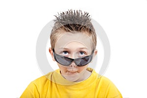 Crazy grimacing child with sunglasses