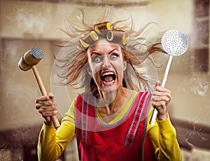 Crazy housewife with kitchen tools