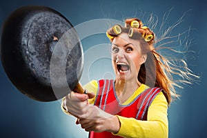 Crazy housewife with pan