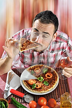 Crazy hungry man eating pizza