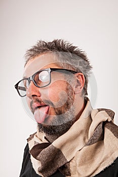 Crazy looking old man with grey beard with nerd big glasses