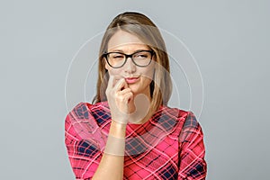 Crazy looking sly woman in glasses 