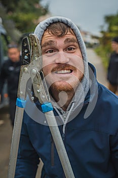 Crazy man attacking with scissors