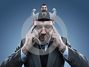 Crazy man in the head of young businessman