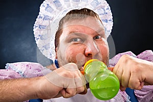 Crazy man with a pacifier