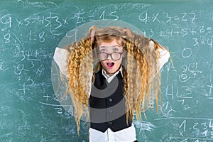 Crazy nerd blond student girl hold hair surprised