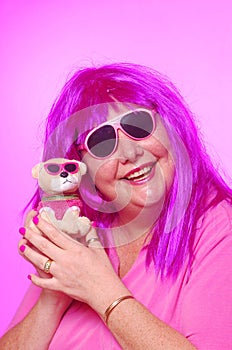 Crazy pink woman with teddy dog