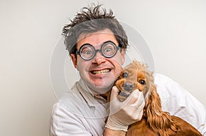 Crazy veterinarian and funny smiling dog