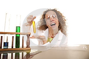 Crazy woman scientist with test tubes show one