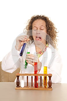 Crazy woman scientist with test tubes yuck