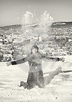 Crazy woman throws white snow, colorless