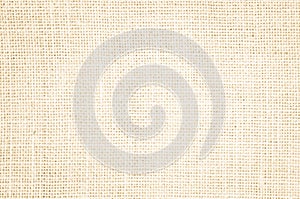 Cream abstract Hessian or sackcloth fabric or hemp sack texture background