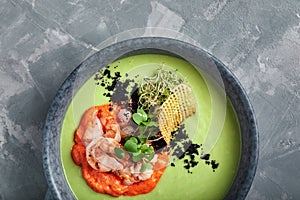 Cream of asparagus soup with shrimp. Green asparagus soup with tiger prawns, Food photo, healthy eating, wholesome food.