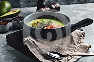 Cream of asparagus soup with shrimp. Green asparagus soup with tiger prawns, Food photo, healthy eating, wholesome food.