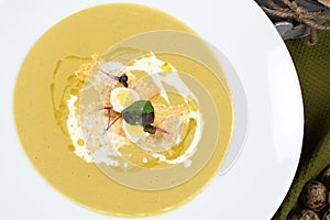 Cream of asparagus soup is a soup prepared with asparagus,stock and milk or cream as ingredients