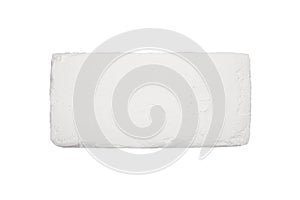 Cream briquette of ice cream on a white background.