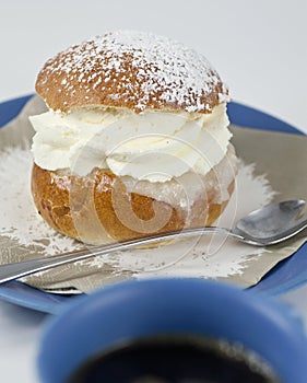 Cream bun with almond paste and coffee