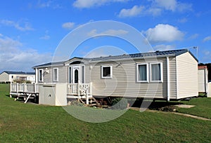 Cream caravans in trailer park photo