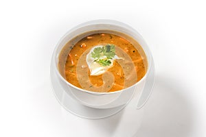 Cream Carrot Soup Garnished with Sour Cream