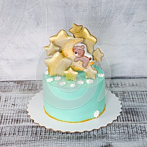 Cream cheese blue kid cake with gingerbread teddy and stars