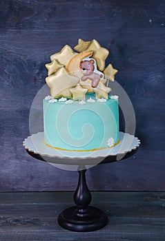 Cream cheese blue kid cake with gingerbread teddy and stars