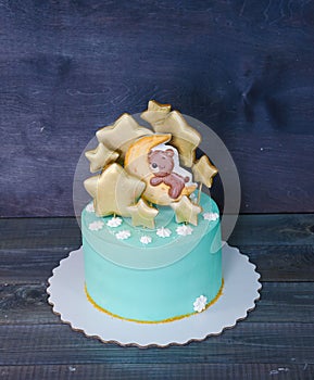 Cream cheese blue kid cake with gingerbread teddy and stars