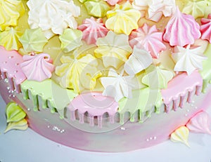 Cream cheese cake with chocolate twist and bright merengue decor