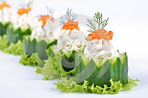 Cream cheese with caviar on cucumber
