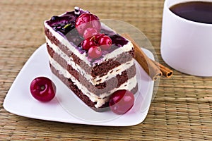 Cream Cherry Cake and Coffee Cup