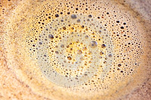 Foaming coffee on top