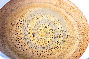 Foaming coffee on top