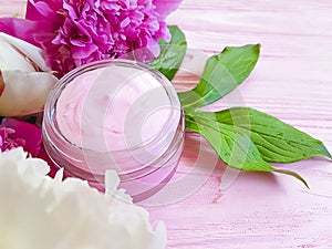 Cream cosmetic bloom peony moisturizing spring aromatherapy flower wooden background