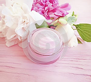 Cream cosmetic petal bloom peony cleanser moisturizing spring aromatherapy flower wooden background