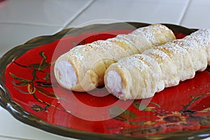 Cream Horn pastries with powdered sugar photo