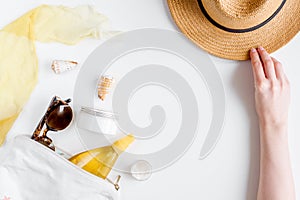 Cream and lotion cosmetic for sun protection on white background top view