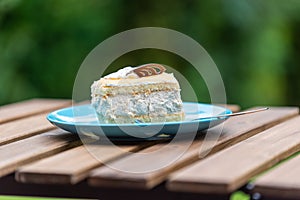 Cream nut cuts on a plate with a fork
